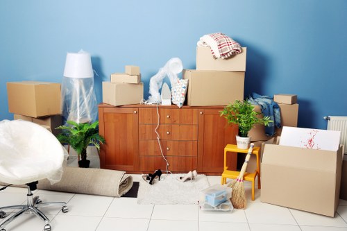 Vans and crew preparing eco-friendly removal in Paddington